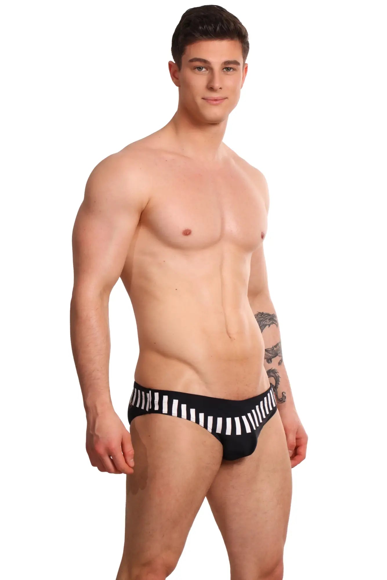 Black and white striped form-fitting swim trunks from marcuse verve bikini swimwear in a snug design