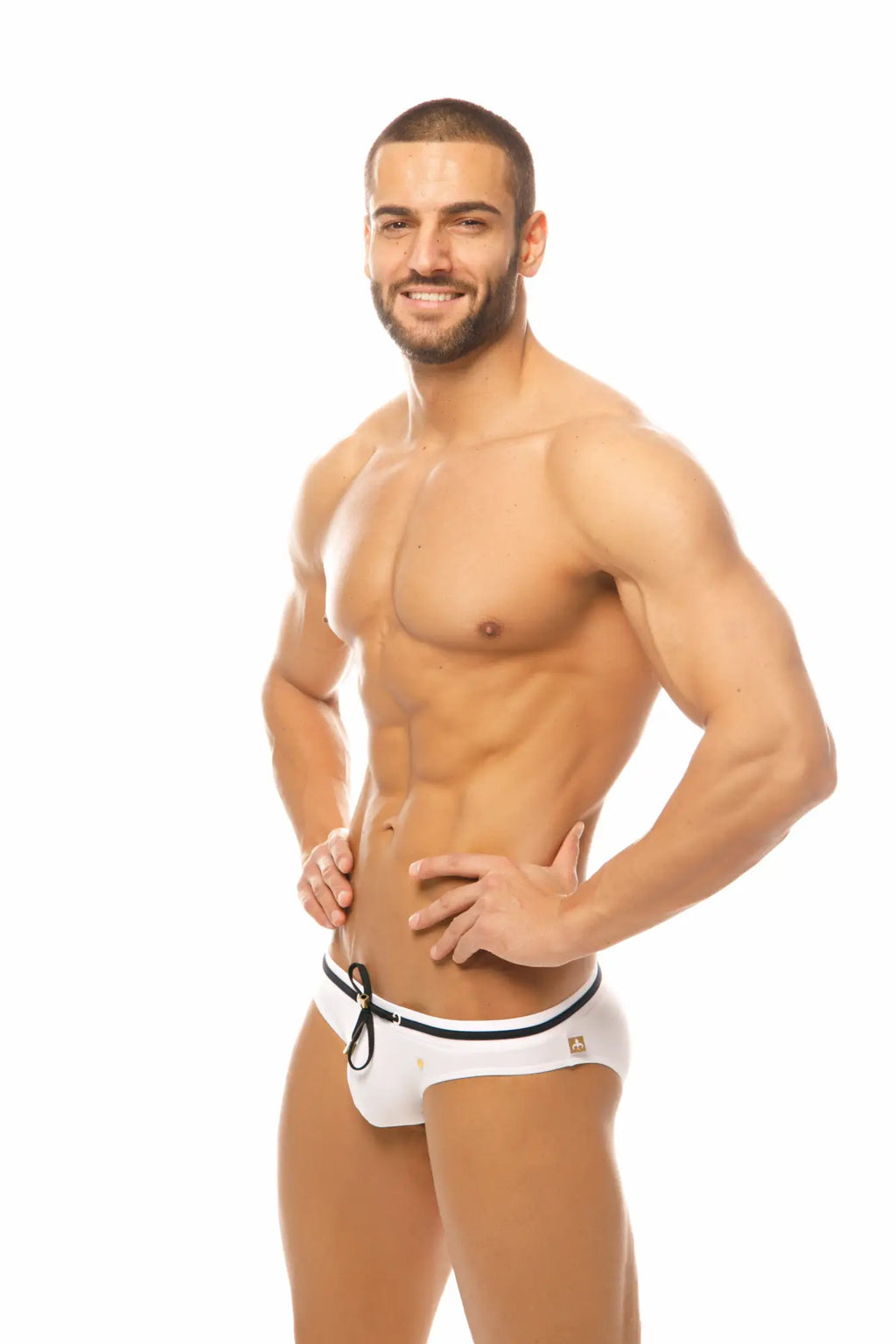 White marcuse volie bikini swimwear trunks with black trim and small gold logo on the side