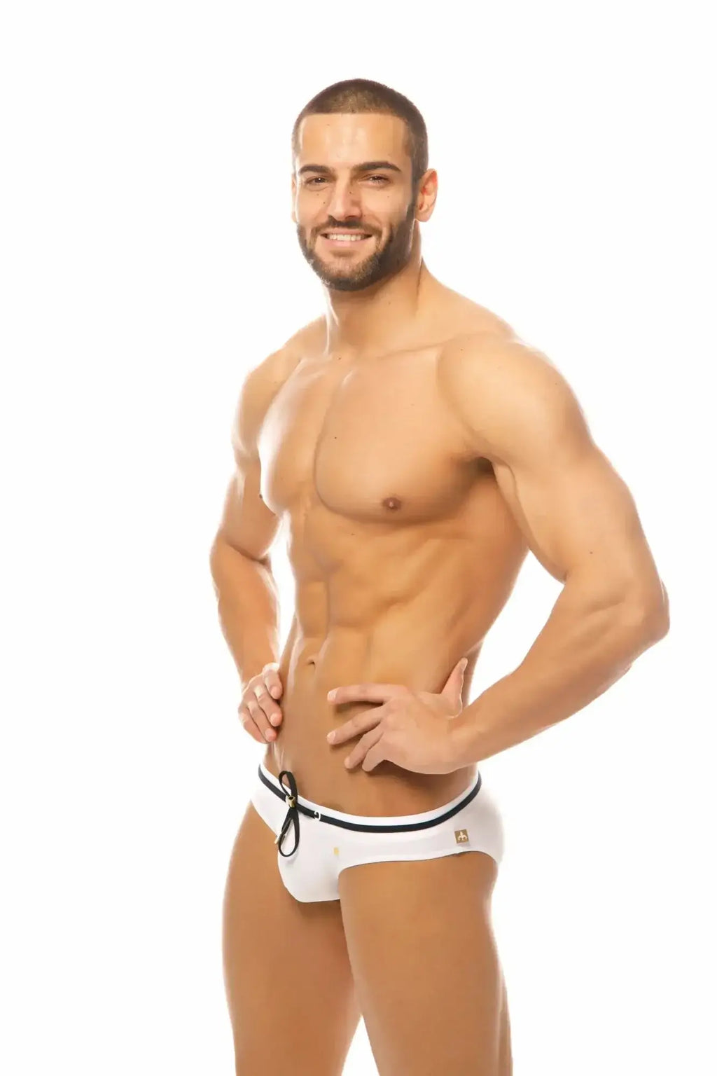 White marcuse volie bikini swimwear trunks with black trim and small gold logo on the side