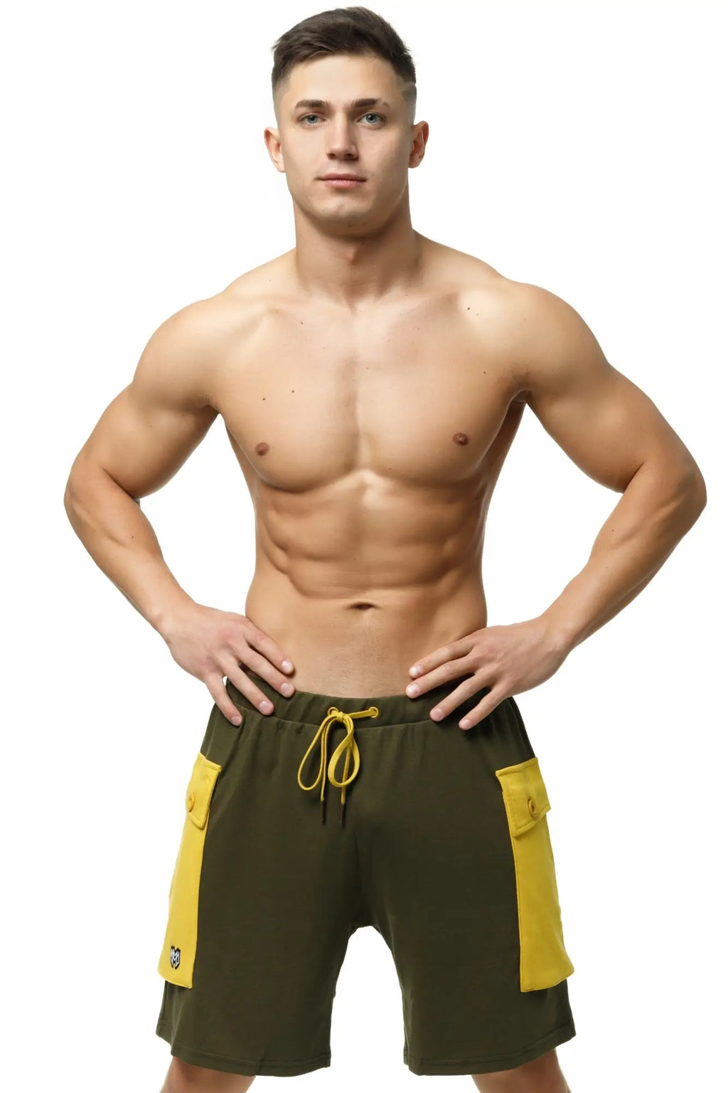 Olive green marcuse zaiden cargo shorts with bold yellow side panels and matching drawstring for casual wear