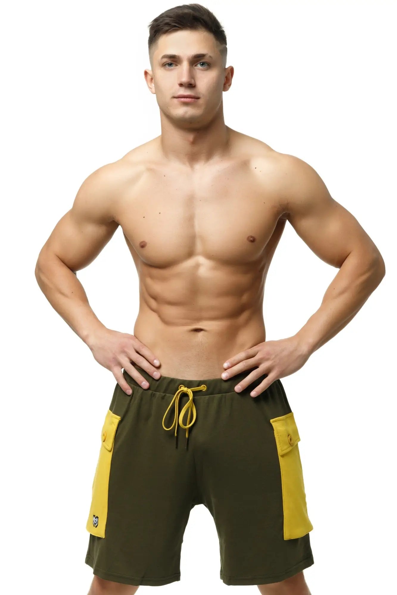 Olive green marcuse zaiden cargo shorts with bold yellow side panels and matching drawstring for casual wear