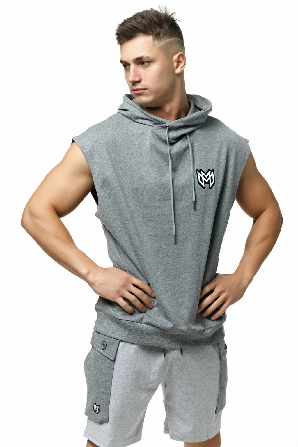 Marcuse Zaiden gray sleeveless hoodie tank top with black and white logo on the chest for casual wear