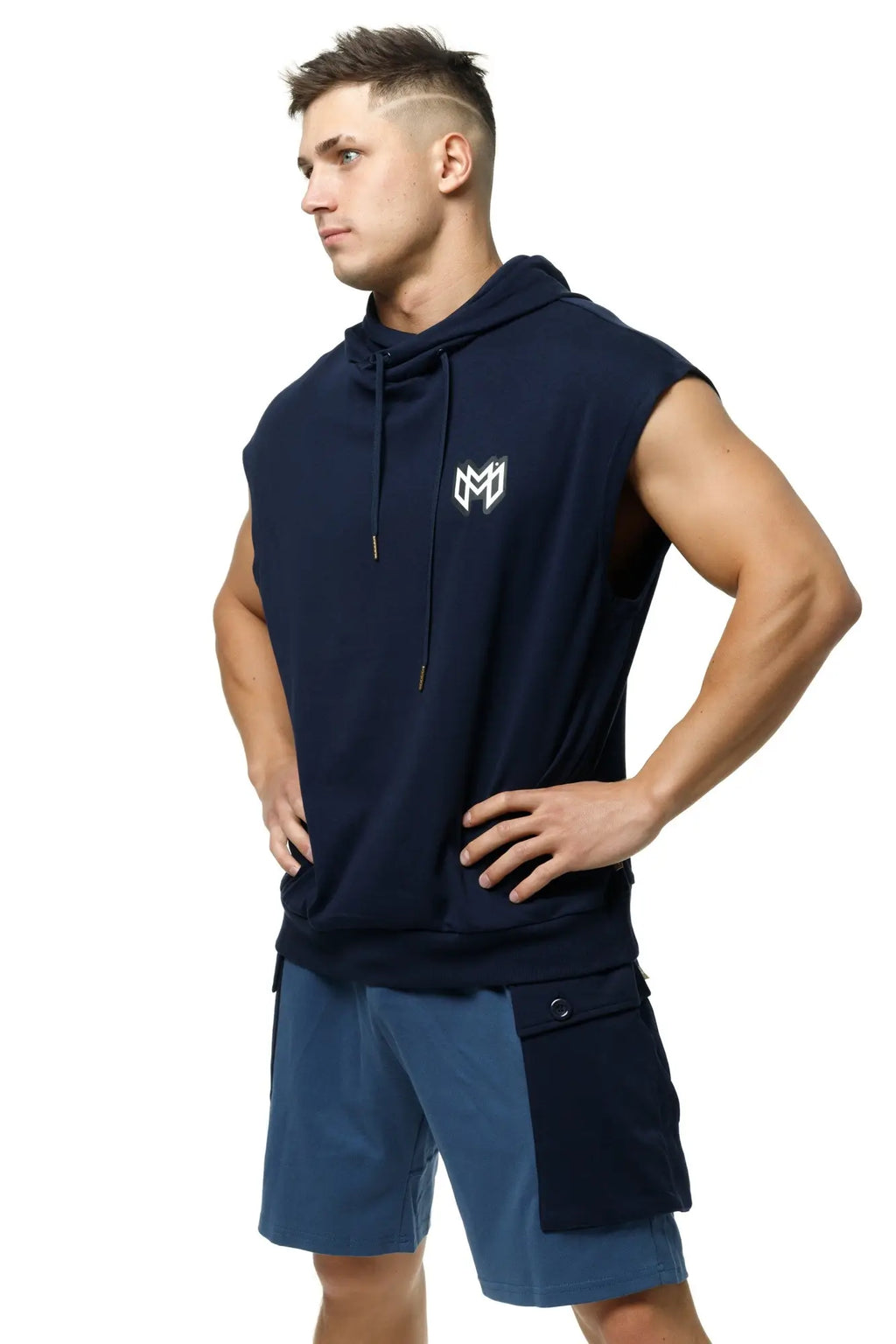 Navy blue marcuse zaiden sleeveless hoodie tank top with white logo on chest and drawstring hood for casual wear
