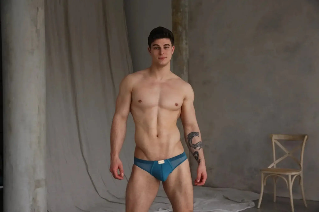 Marcuse Zenith bikini swimwear blue mesh briefs with a small white label at the front
