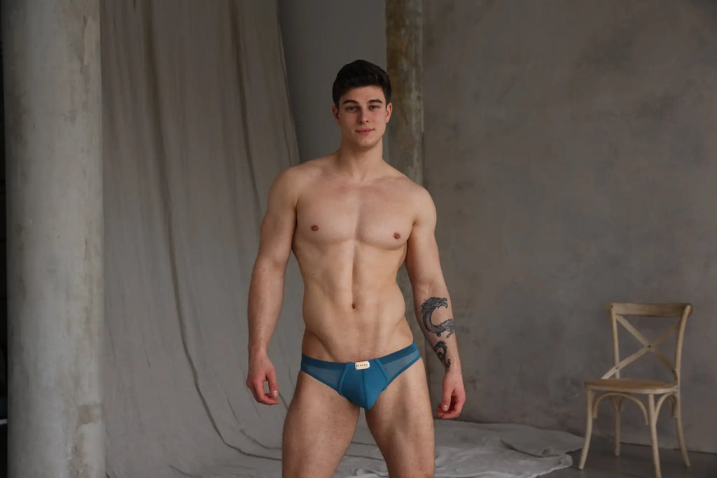 Marcuse Zenith bikini swimwear blue mesh briefs with a small white label at the front