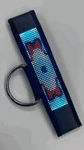 A sleek black led keychain with a glowing blue and red pixelated design and sturdy metal ring from marquee center strap 2.0