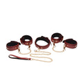 Set of four burgundy pu leather cuffs with gold-tone chains and matching wrist leash from master series bondage set