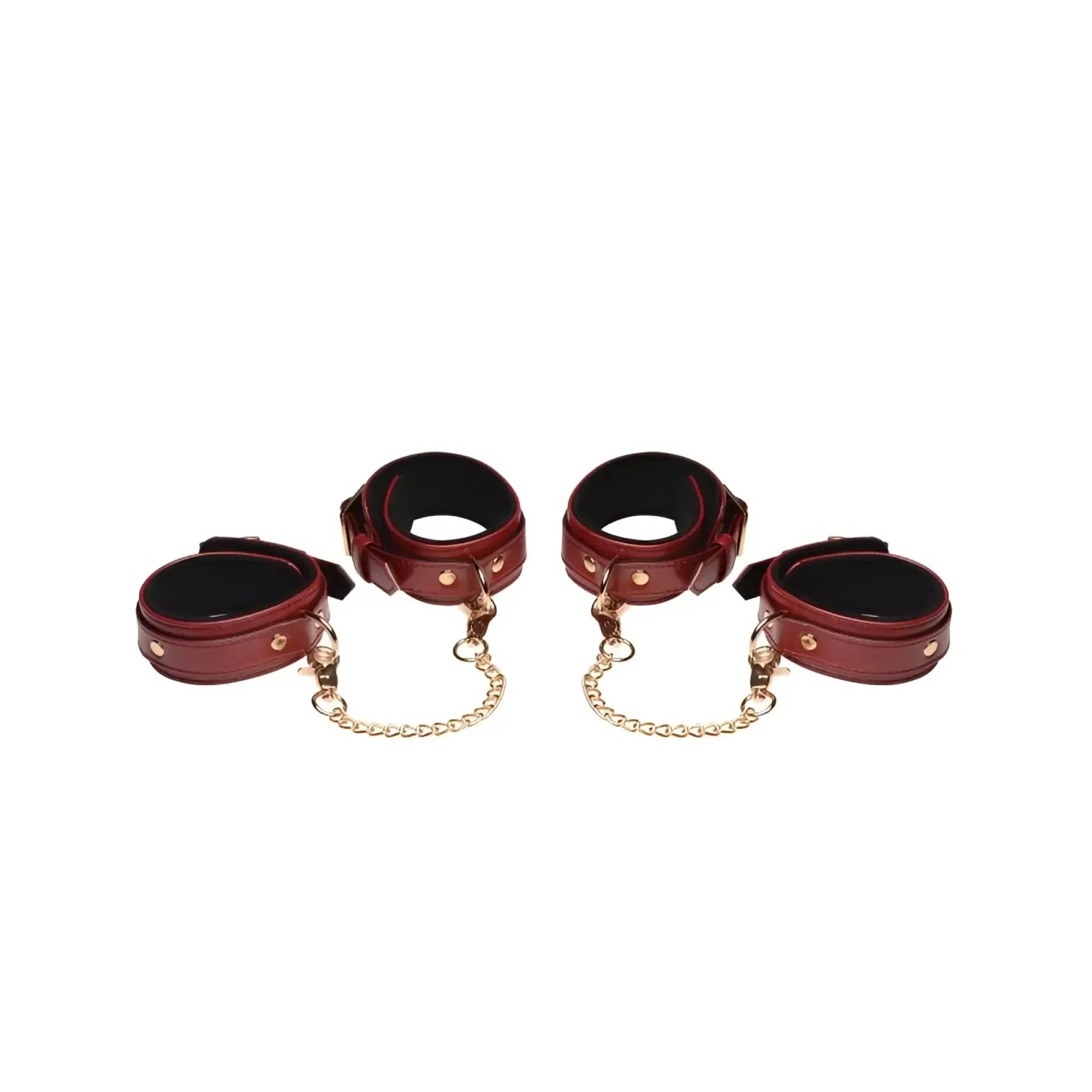 Set of four burgundy pu leather cuffs with gold-tone chains and hardware from master series bondage set