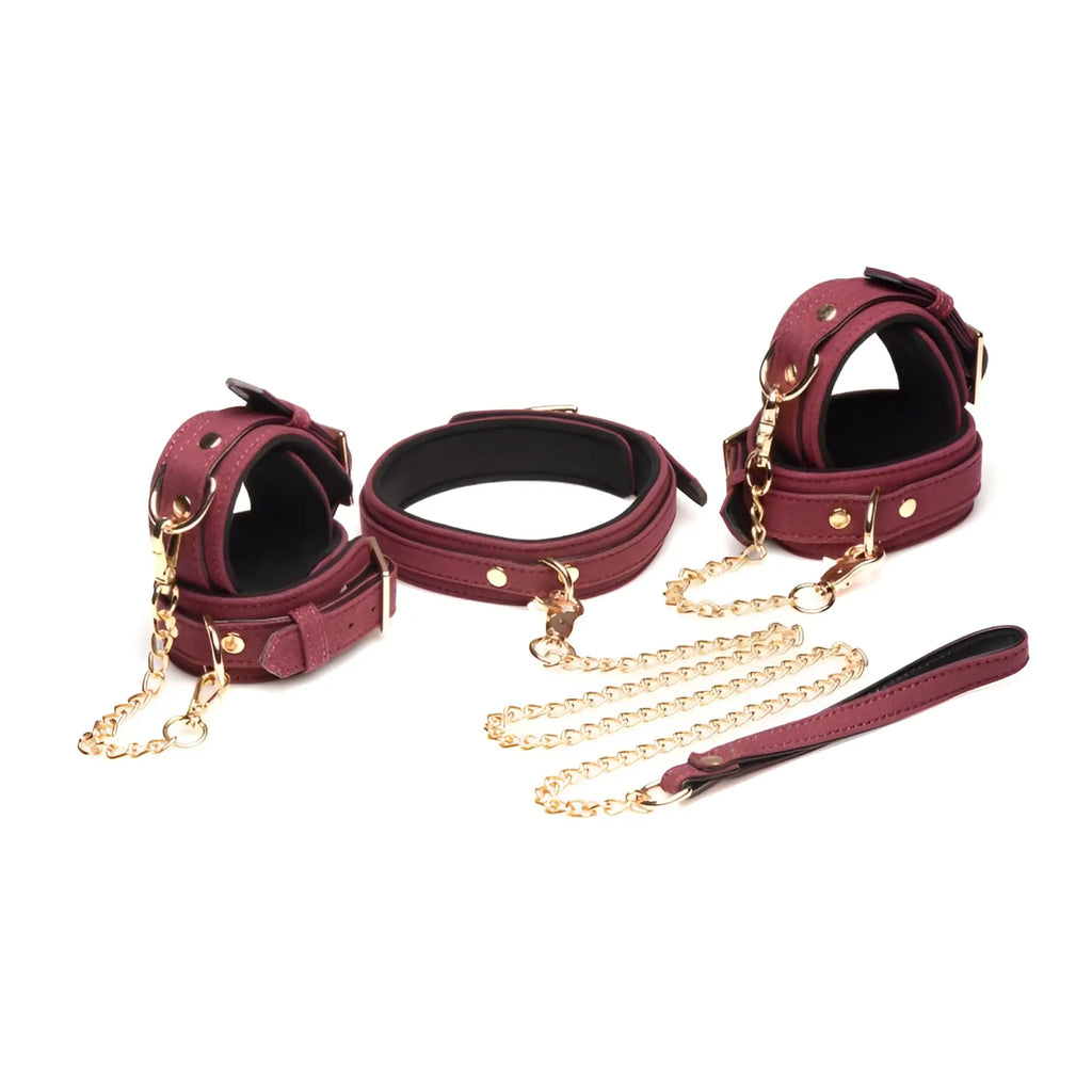 Master series 6 pc velvet bondage set burgundy featuring maroon leather with gold toned chains and hardware