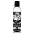 Clear plastic bottle with black cap and silver black label of master series ass relax desensitising lubricant 4.25 fl oz