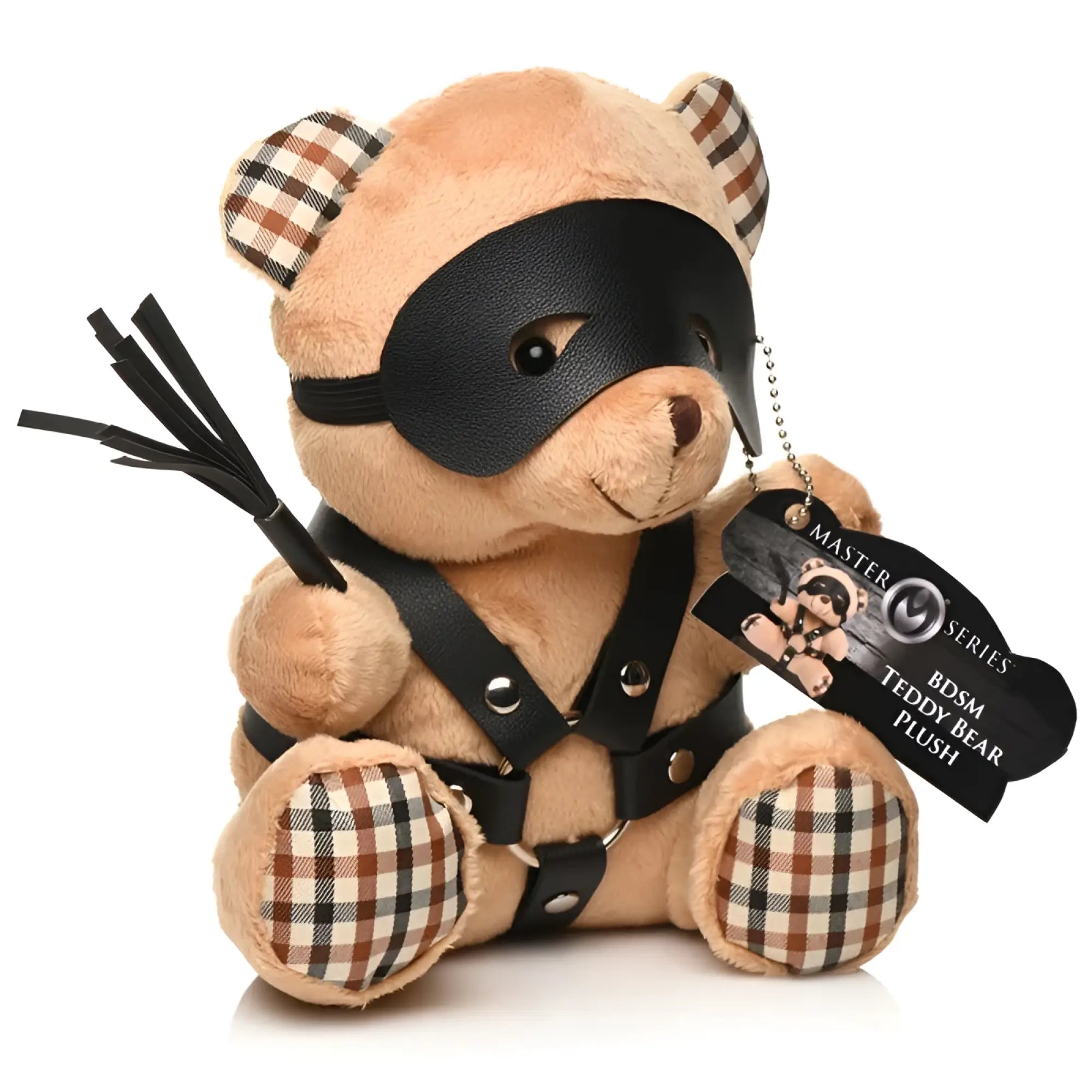 A tan plush teddy bear with plaid ears and paws wearing a black leather mask and harness from master series bdsm