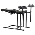 Black leather-bound master series extreme obedience chair with adjustable metal frame and padded seating for restraint