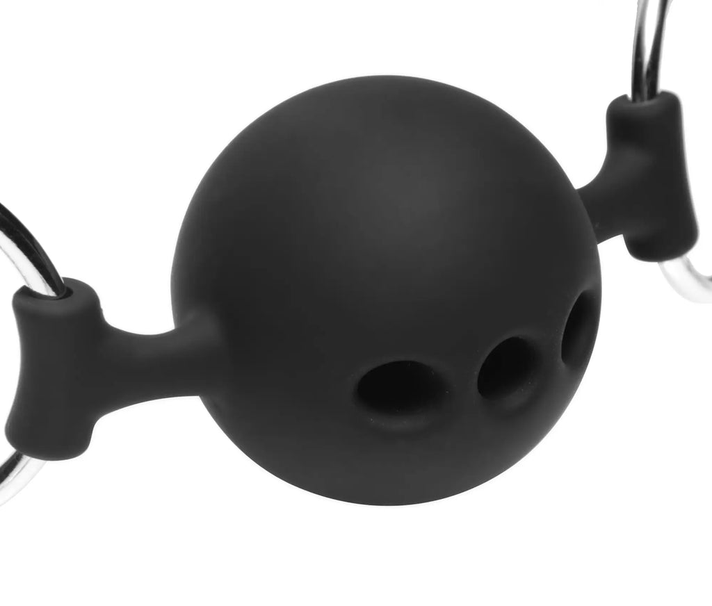 Black silicone mouth gag with three circular openings and metal rings from master series hinder breathable gag