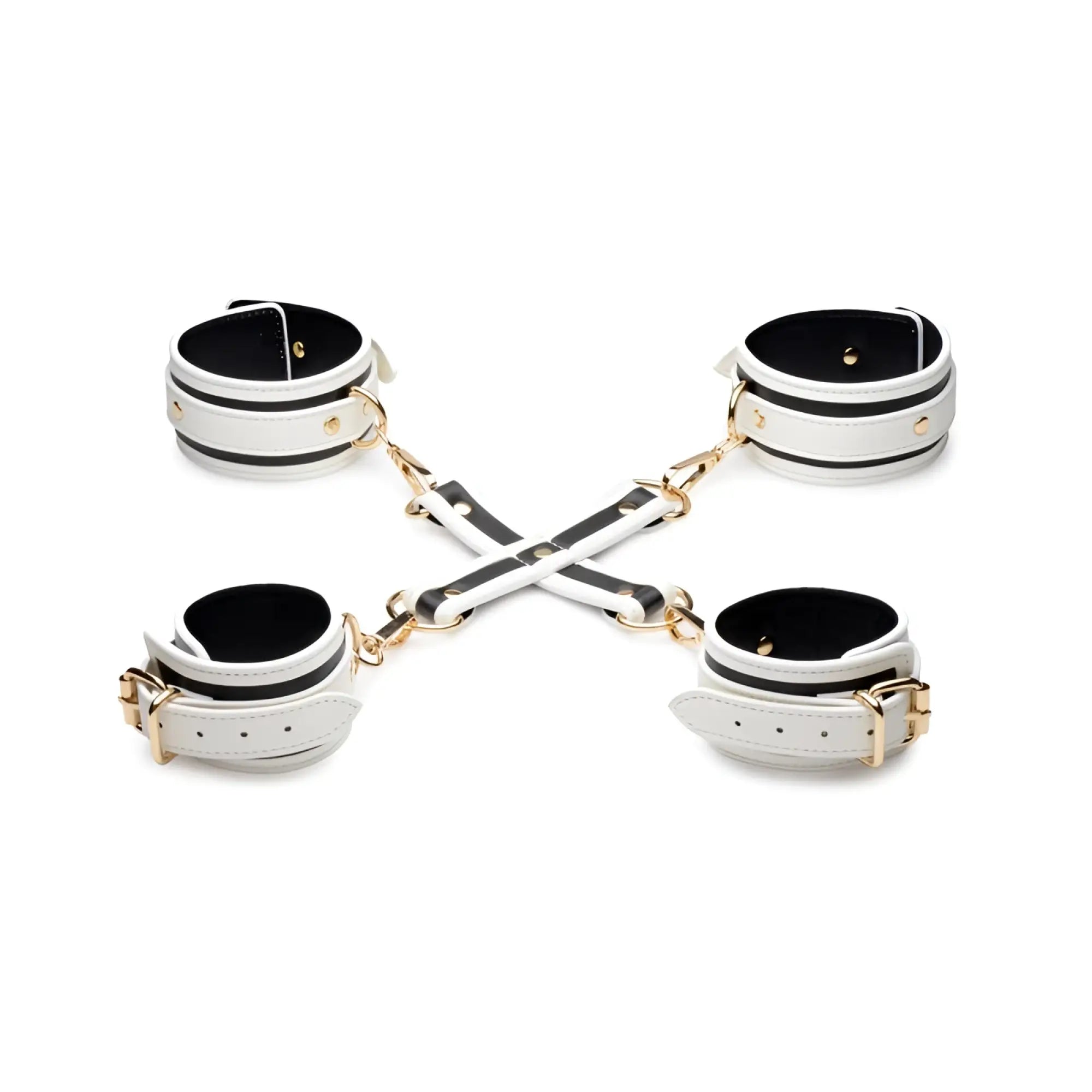 White leather handcuffs with black stripes and gold hardware connected by cross-shaped chain in kink in the dark set