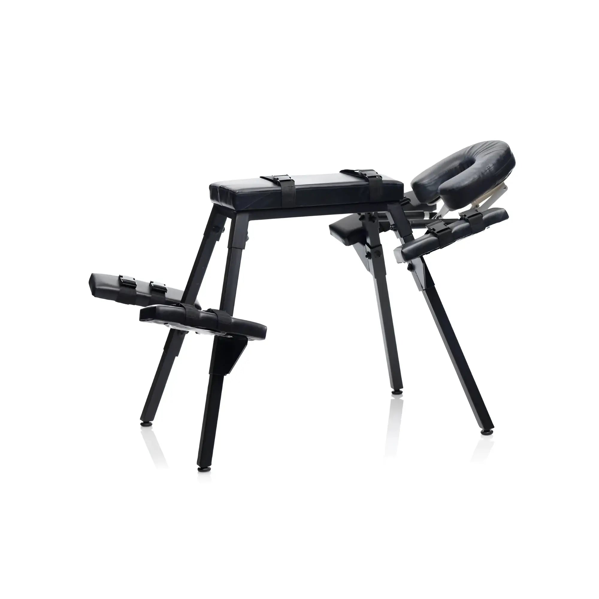 Black padded massage table with adjustable headrest footrest sturdy metal frame and restraint straps master series obedience bench