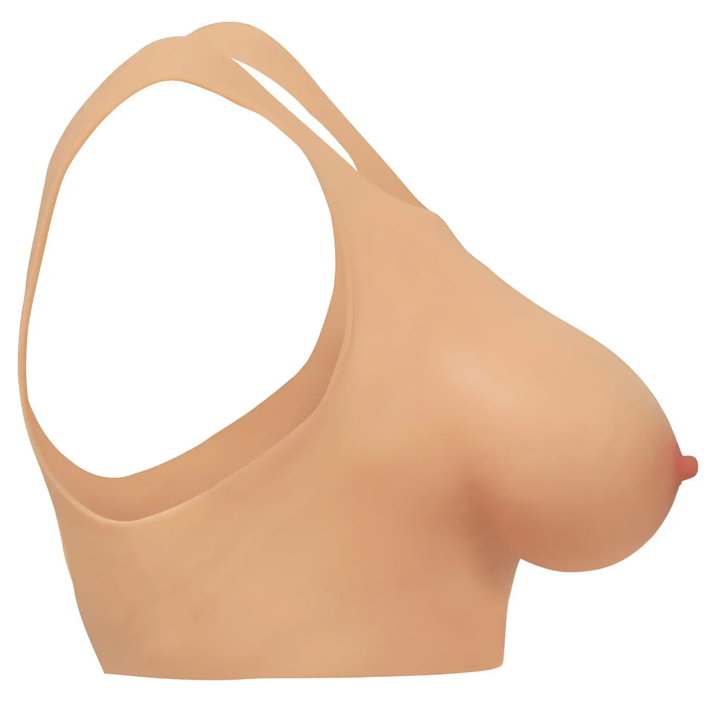 Master series perky pair d cup beige silicone breast form with realistic contours and natural-looking nipple