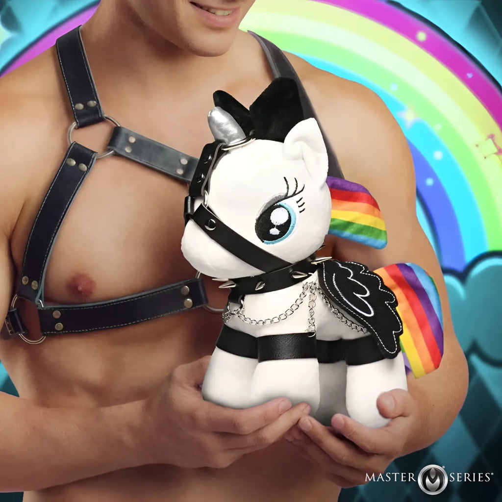 White plush pony with black leather harness and rainbow-colored wings from master series prism pearl bondage pony