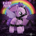 Purple plush pony with wings and silver horn wearing black leather straps and chains from master series raven plum bondage pony