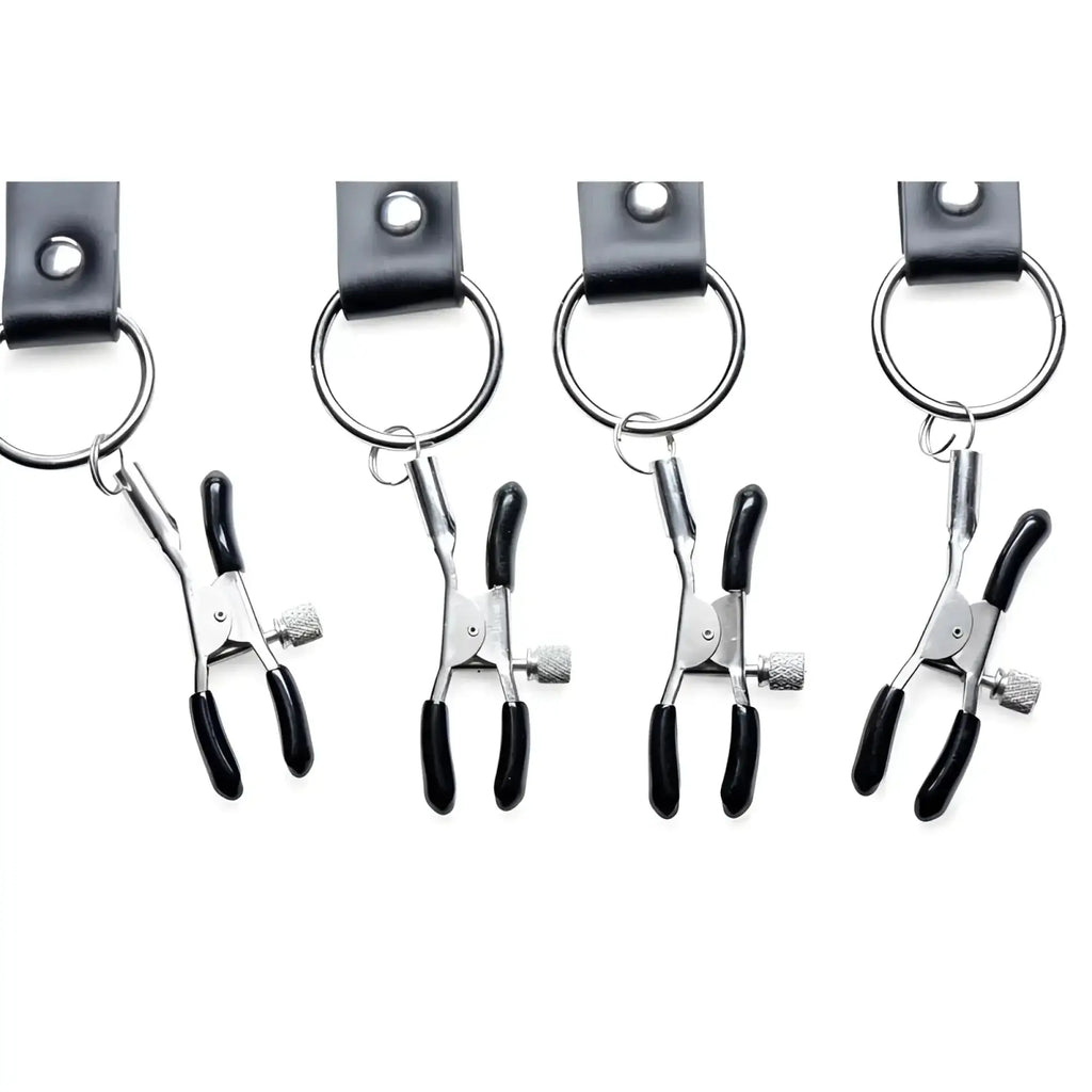 Set of four black and silver breast clamps with leather keychain rings from master series spread xl labia spreader straps