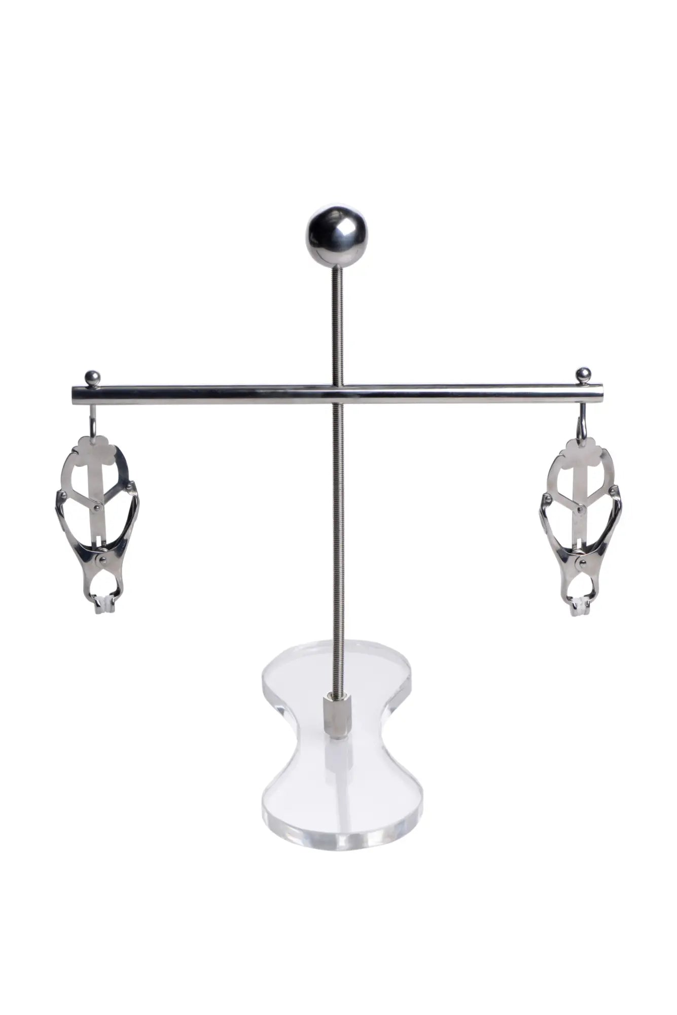 Silver metallic claw-style nipple clamps from master series the tower of pain displayed on clear acrylic stand