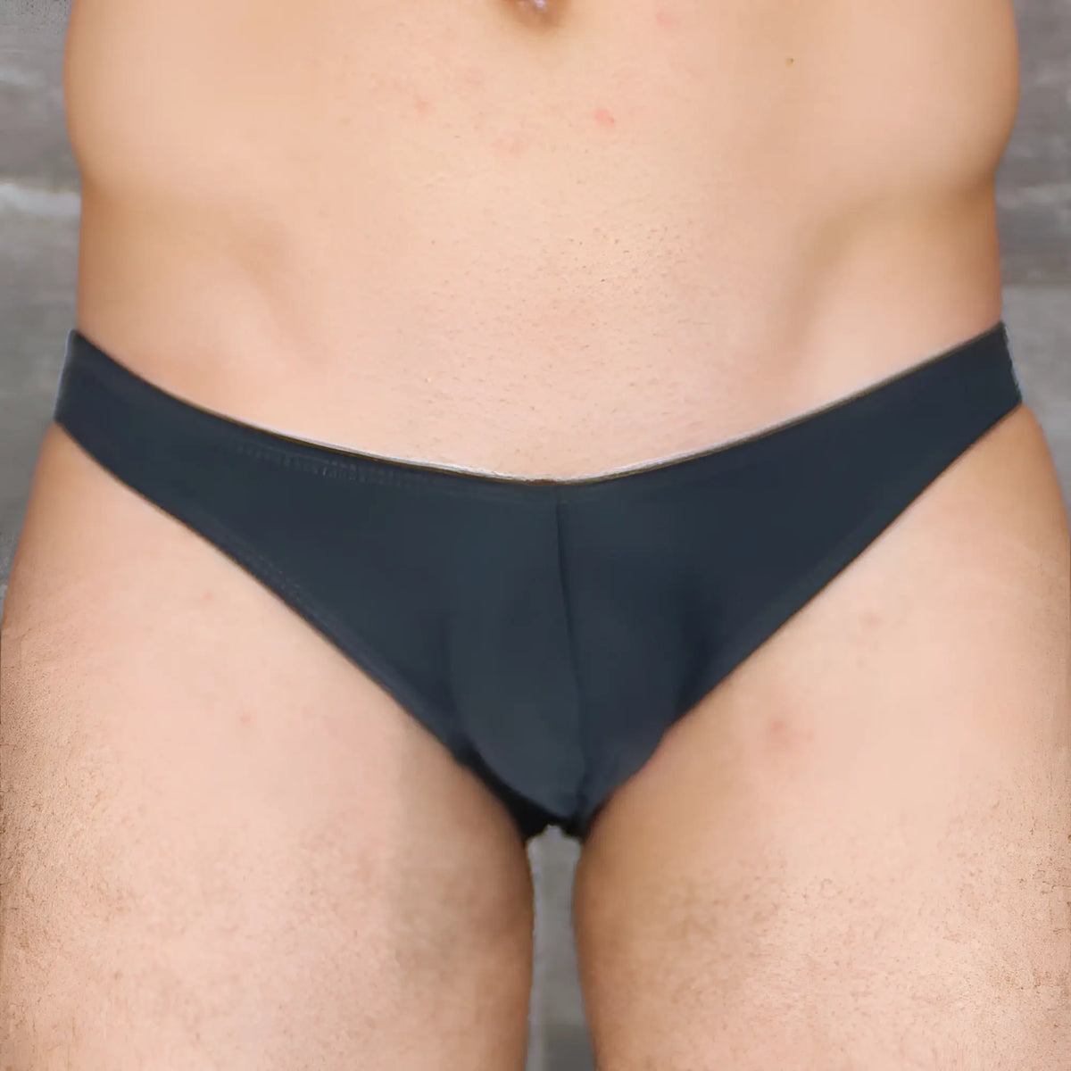 Black seamless hoist bikini briefs with low-rise cut and smooth fabric finish from mckillop vkds ta2 naked collection