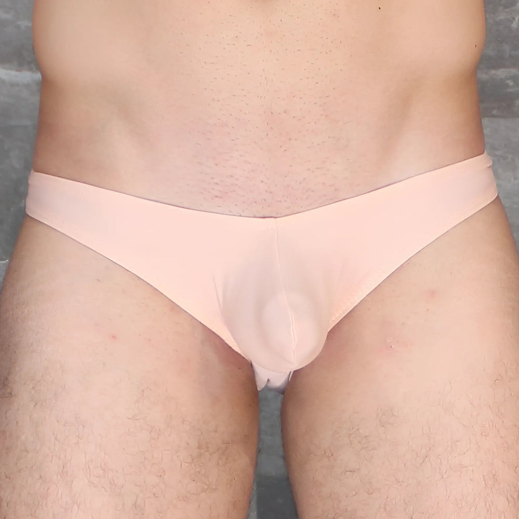A pale pink sheer fabric thong with a smooth form-fitting design from mckillop vkds ta2 hoist bikini naked collection