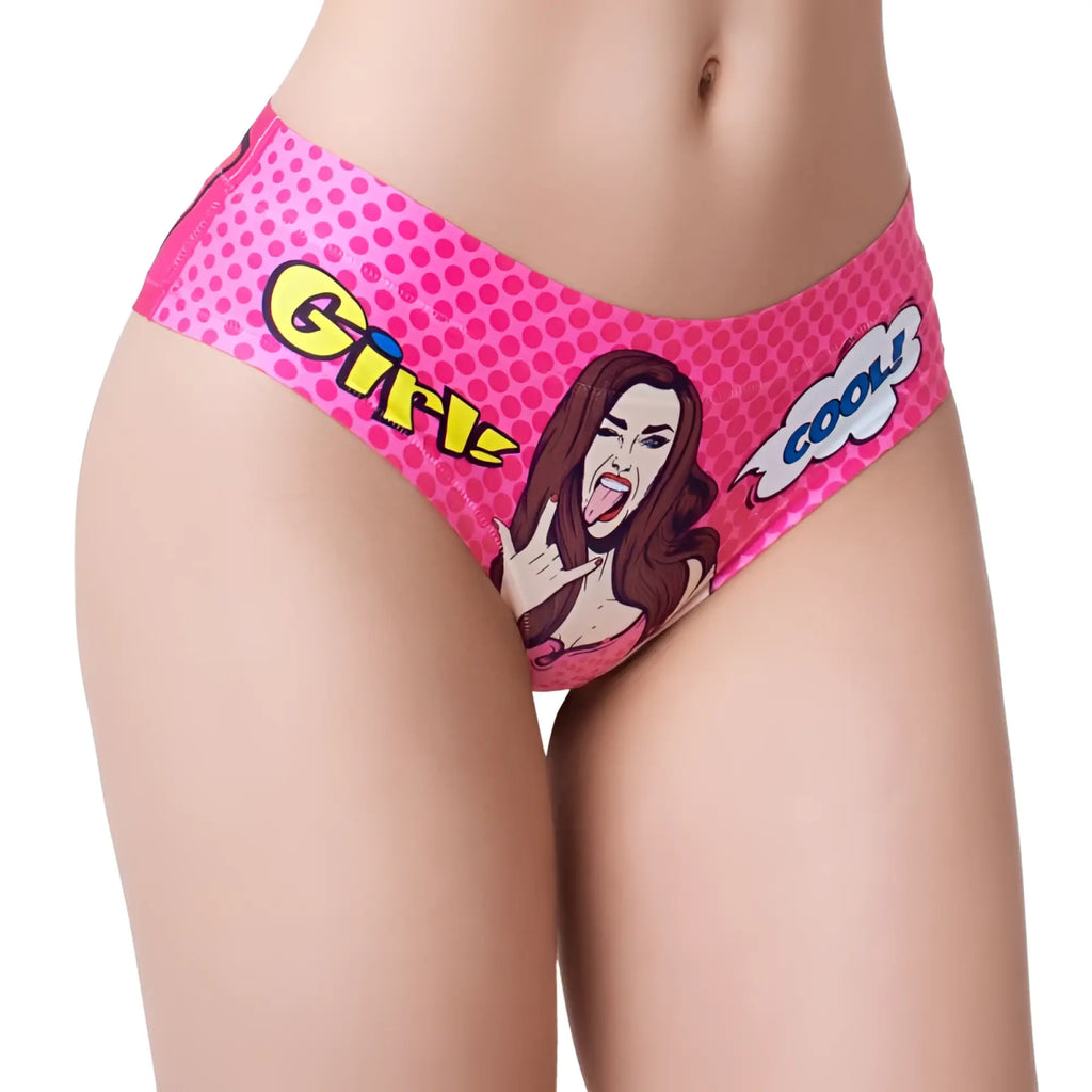 Pink high-waisted bikini briefs from mememe lingerie featuring a pop-art girl illustration and comic text on a polka-dot background