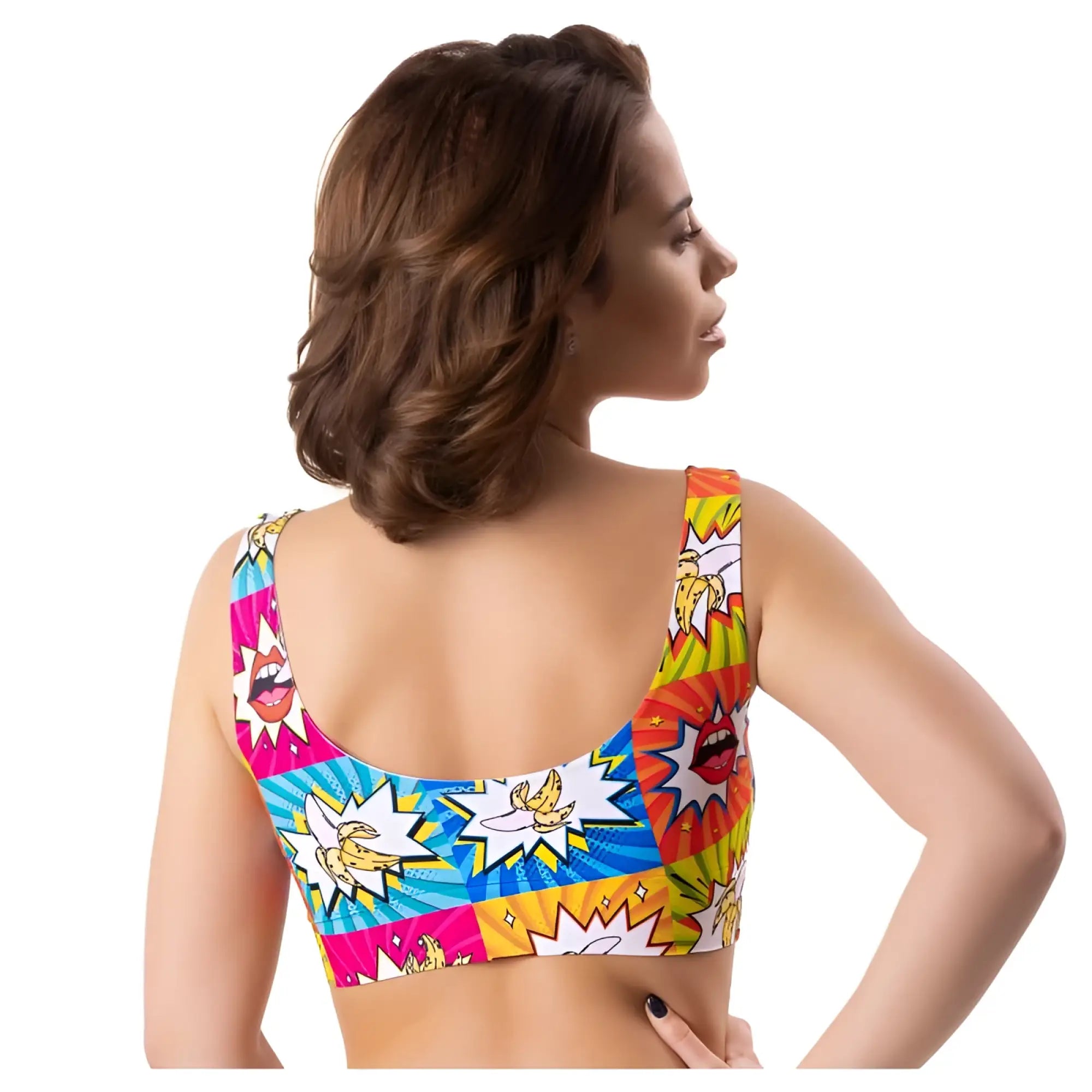 A vibrant sleeveless mememe lingerie comics curios crop top sports bra with comic book design and bright colorful panels