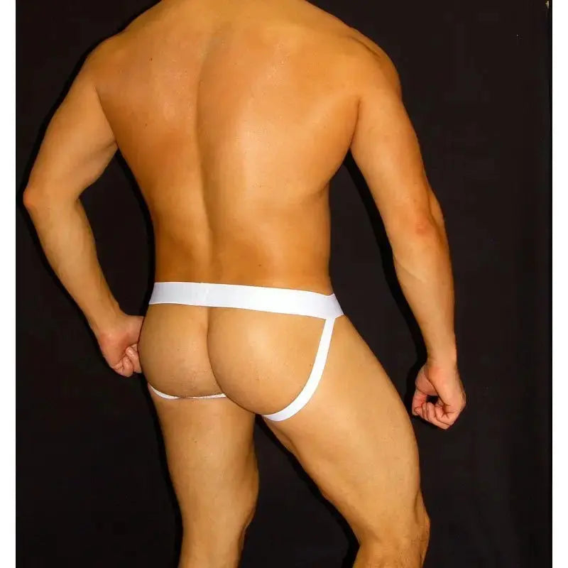 White athletic jockstrap underwear by Arroyman featuring a minimal design and supportive waistband shown on a model from the back.