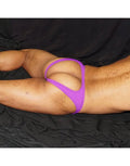 Purple backless bikini underwear by Arroyman featuring a minimal design and soft fabric shown on a model.