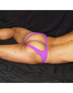 Purple backless bikini underwear by Arroyman featuring a minimal design and soft fabric shown on a model.