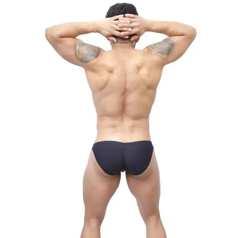 Men's black bikini underwear by Arroyman featuring a color-enhancing design shown from the back on a model.