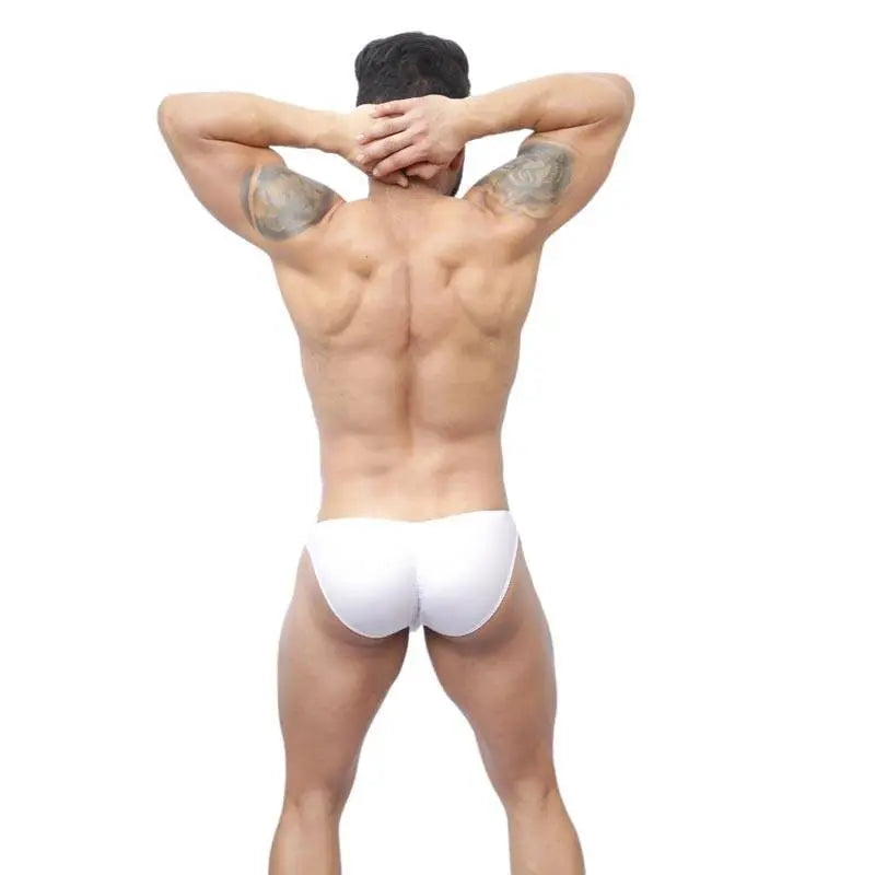 Men's white bikini underwear by Arroyman featuring a snug fit and minimal coverage shown from the back on a model.