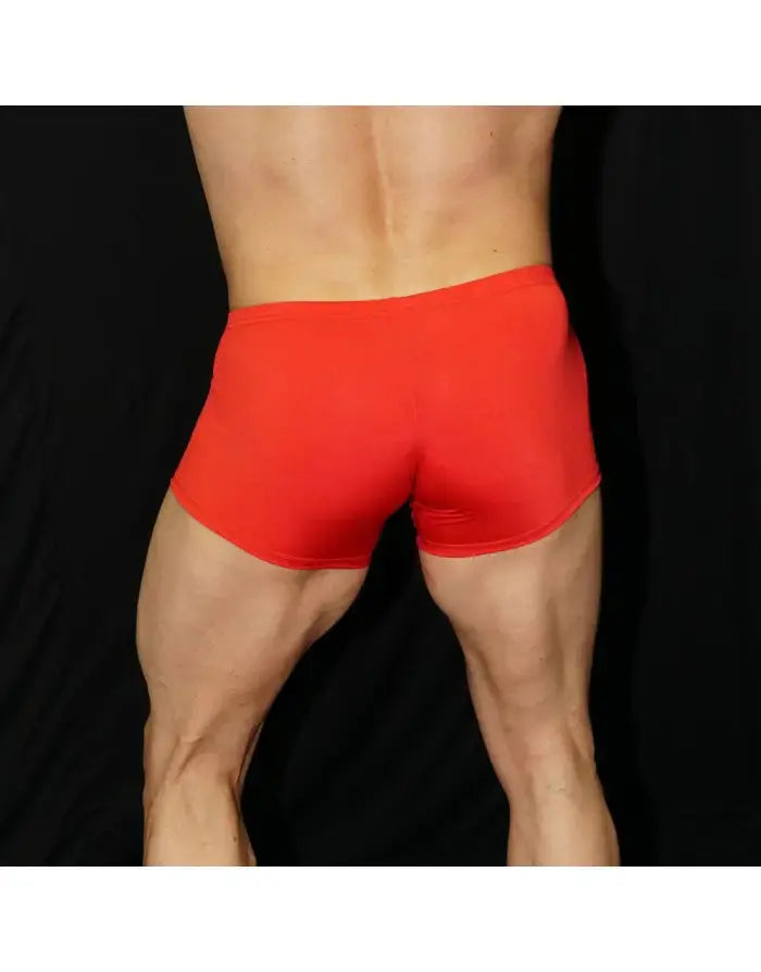 Red boxer underwear by Arroyman featuring a snug fit and smooth fabric shown from the back on a model.
