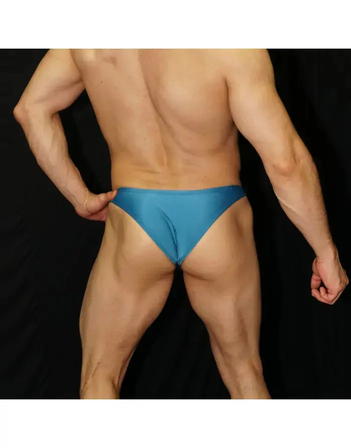 Calypso blue men's micro bikini underwear by Arroyman featuring a sleek design and minimal coverage shown from the back.