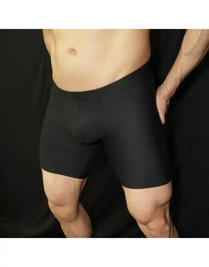 Black compression cycle shorts by Arroyman featuring a snug fit and smooth fabric shown on a model.