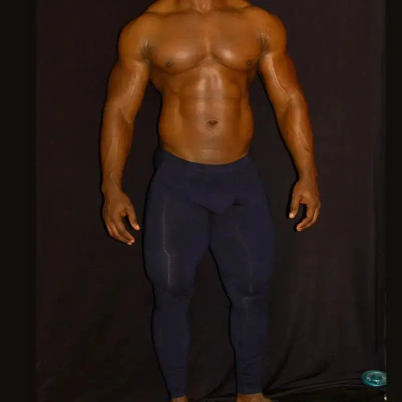 Navy spandex fitness tights by Arroyman featuring a snug fit and smooth texture shown on a model.