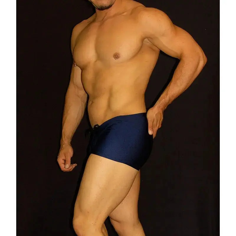 Navy square cut boxer swimwear by Arroyman featuring a fitted design and drawstring waistband shown on a model.
