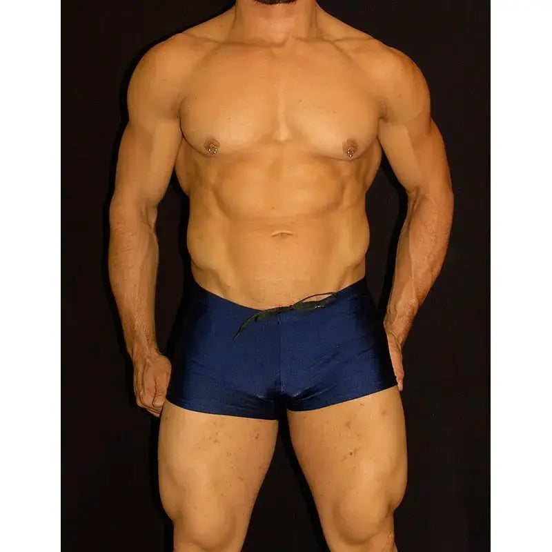 Navy square cut boxer swimwear by Arroyman featuring a drawstring waist and a fitted design shown on a model.