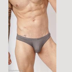 Grey mesh bikini underwear by Arroyman featuring a snug fit and breathable fabric shown on a model.