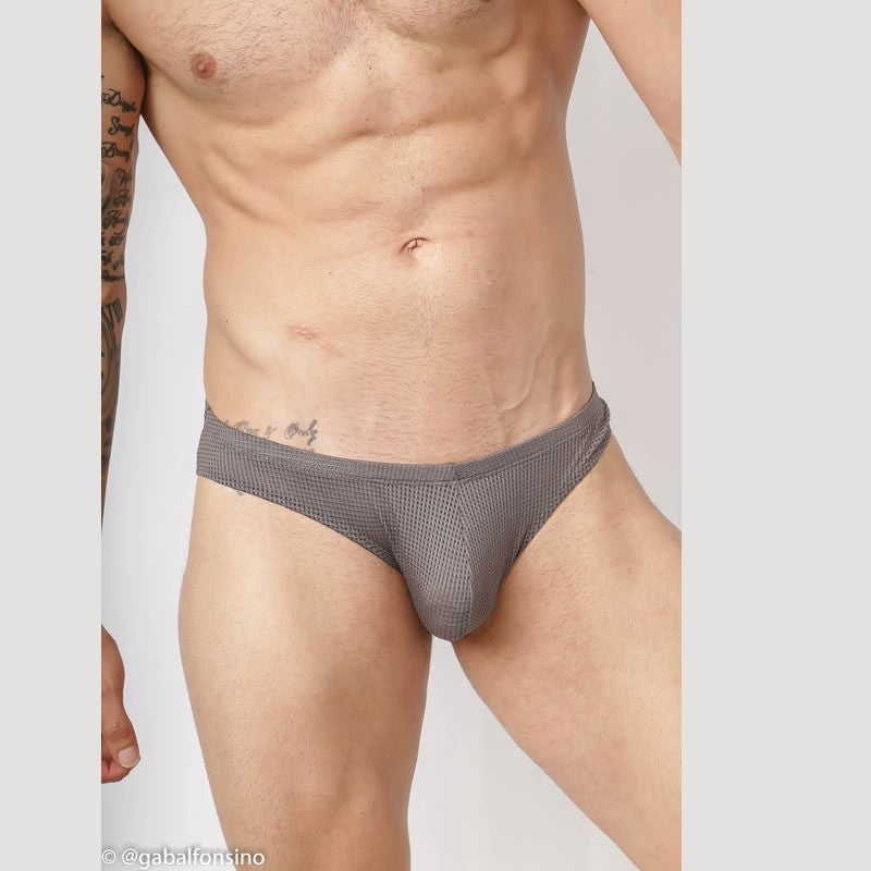 Grey mesh bikini underwear by Arroyman featuring a snug fit and breathable fabric shown on a model.