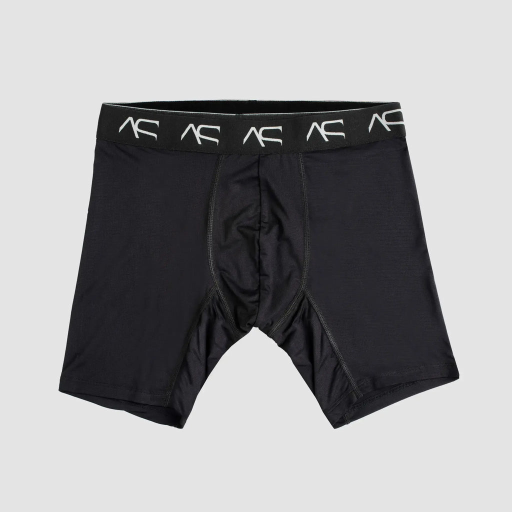 Black mesh short trunks boxer briefs with a white ac logo band designed for athletic performance