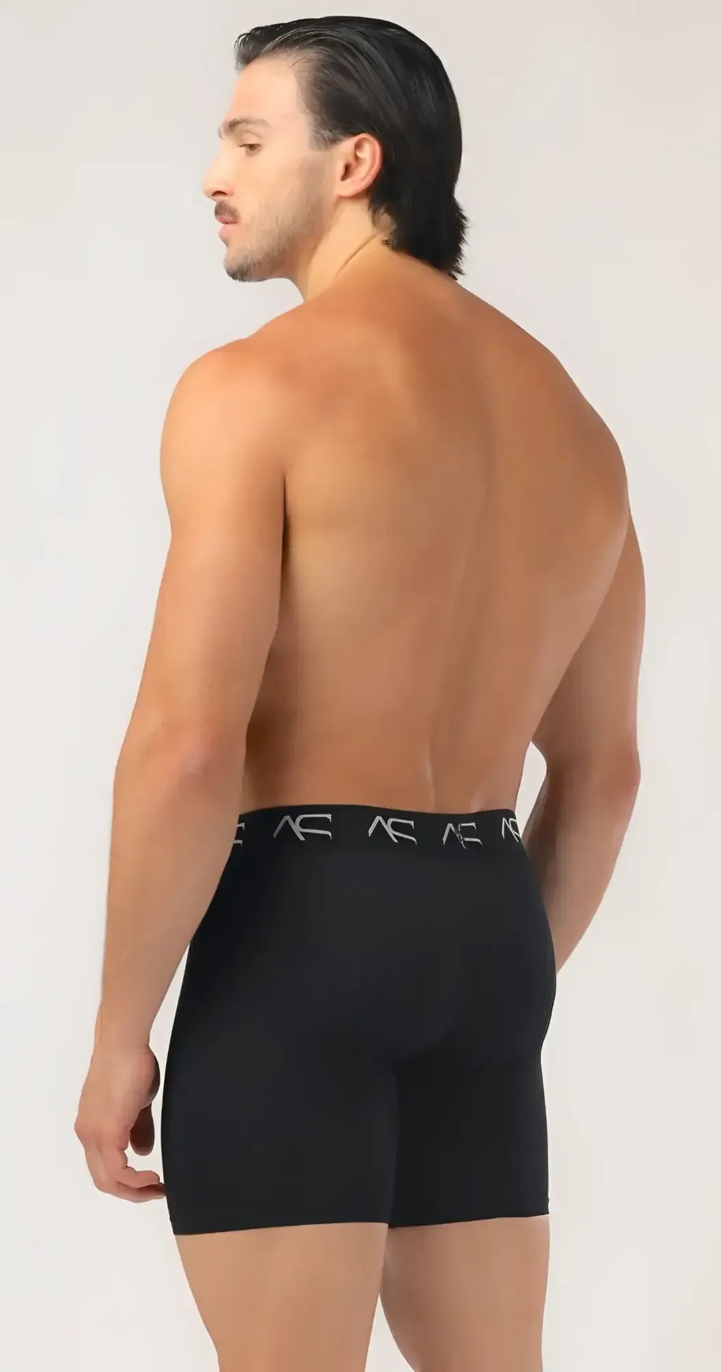 Black menâs mesh short trunks boxer briefs with subtle repeating logo pattern on waistband
