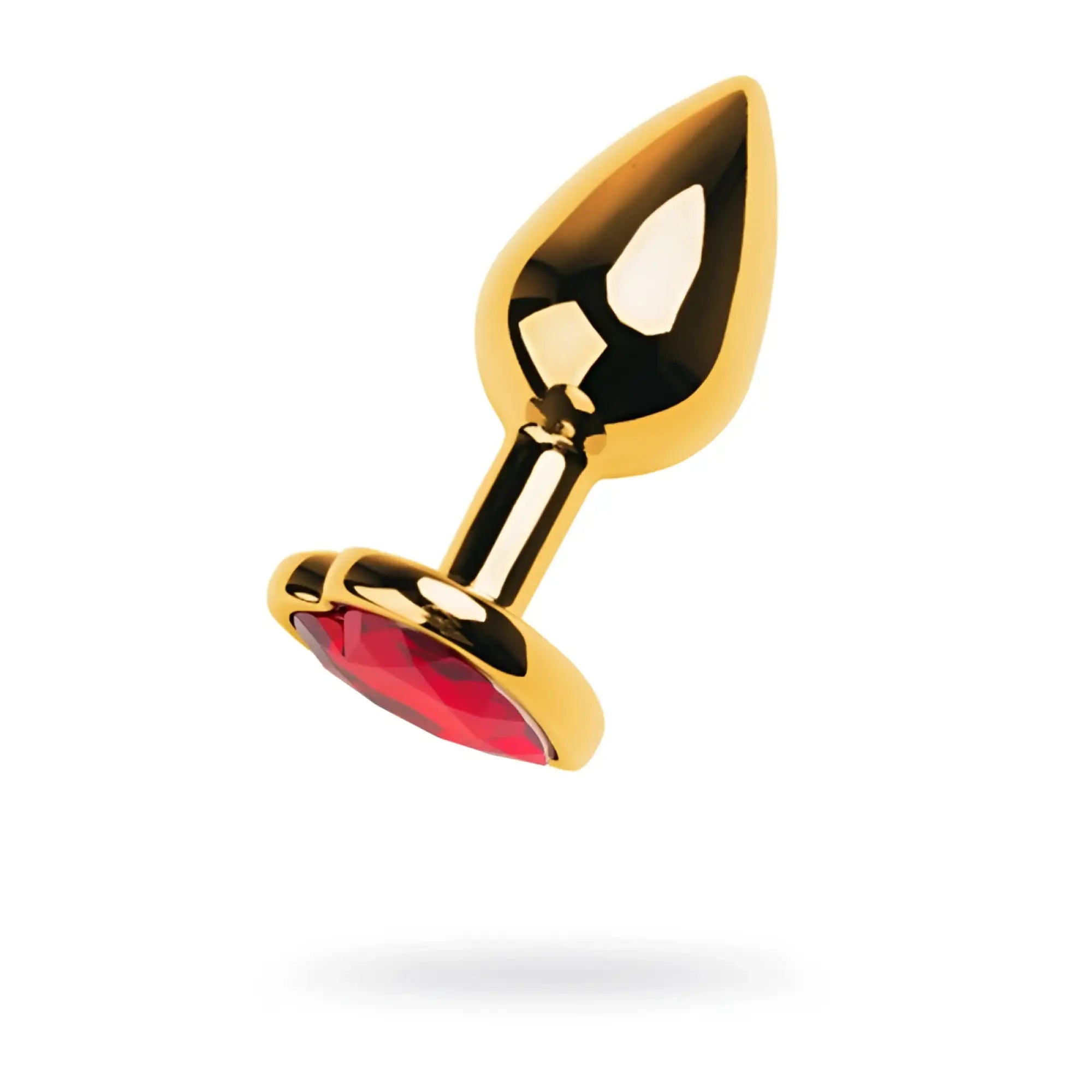 Gold metal anal plug with a small faceted red ruby heart crystal set in the base