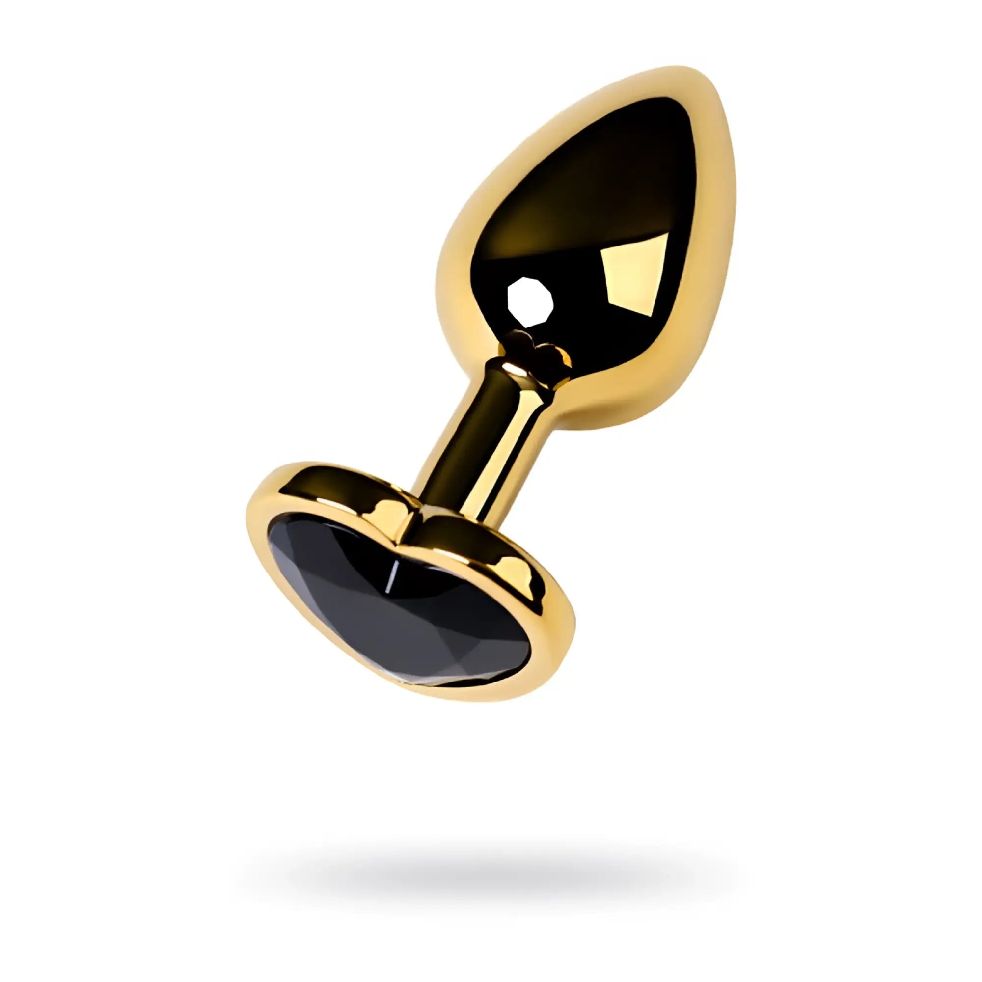 Metal gold metal anal plug with sleek polished finish and black faceted tourmaline heart crystal base