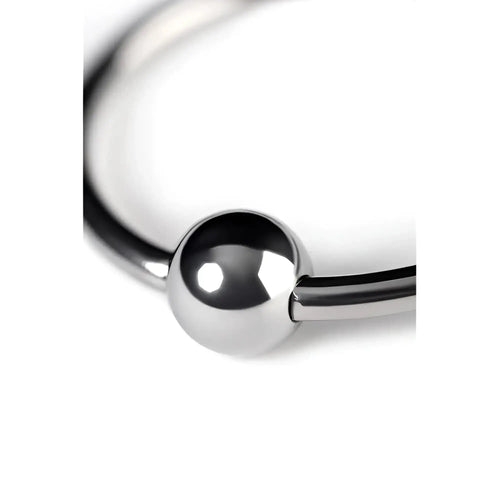 A sleek polished silver metal penis head ring 30mm featuring a smooth spherical bead at its center