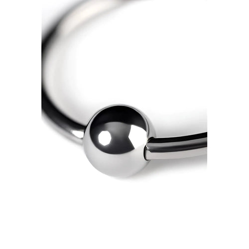 A sleek polished silver metal penis head ring 30mm featuring a smooth spherical bead at its center