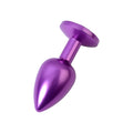 Purple metallic anal plug with smooth tapered design and rounded head featuring a purple crystal base