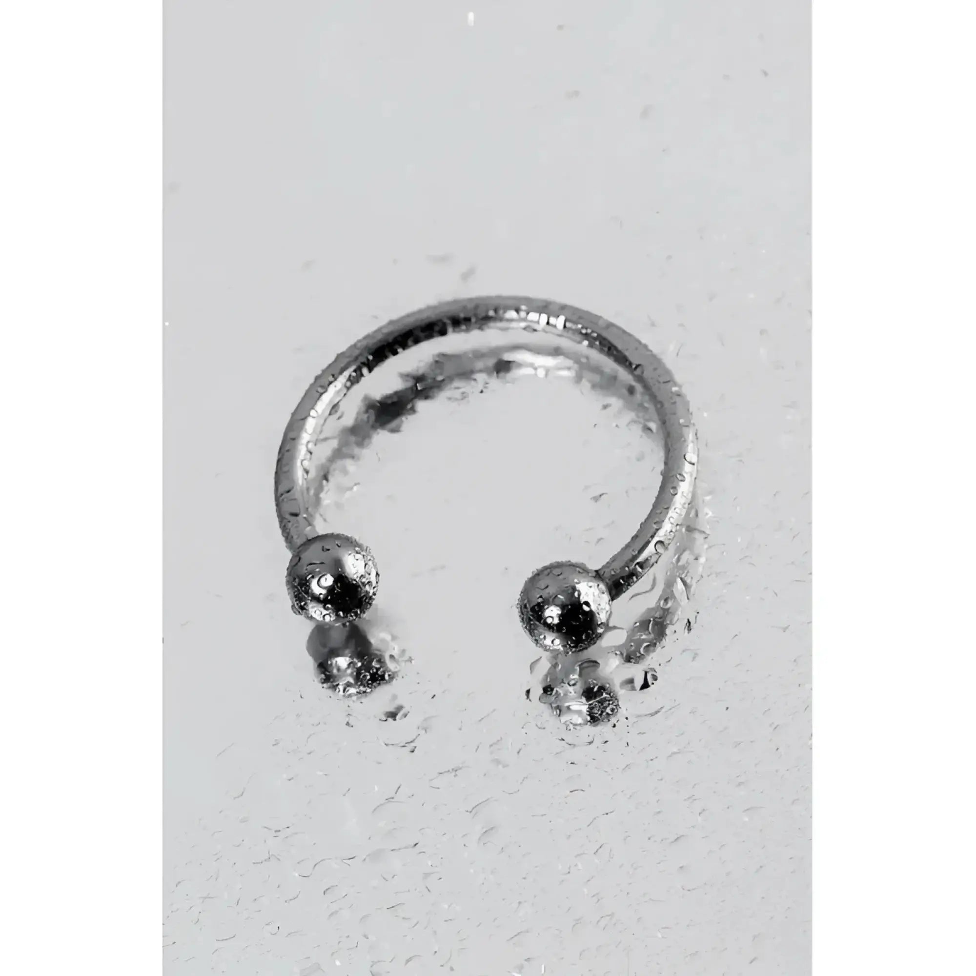 Silver-toned metal 30mm penis erection ring with simple open circle design and two small spherical beads
