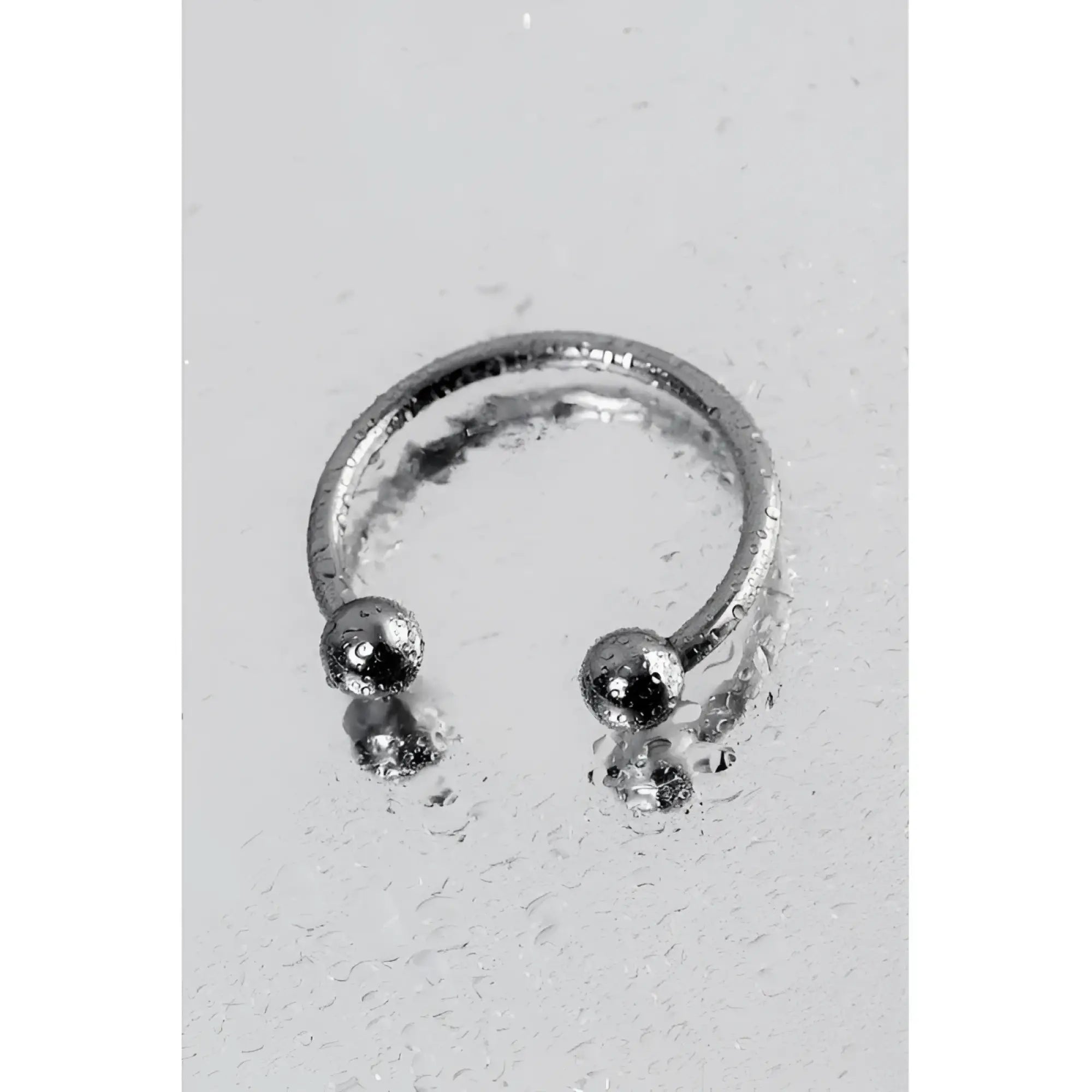 Silver-toned metal 30mm penis erection ring with simple open circle design and two small spherical beads